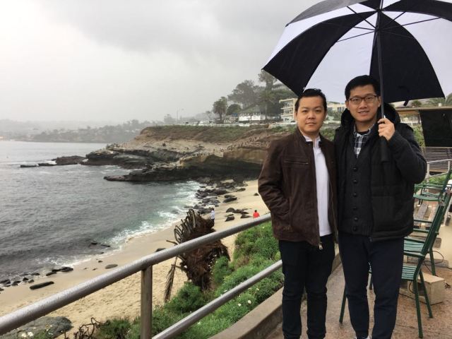 Here is my cousin and me on the rainy day at La Jolla Cove. (Photographed by my aunt) 